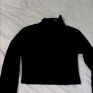 Black crop top turtle neck .